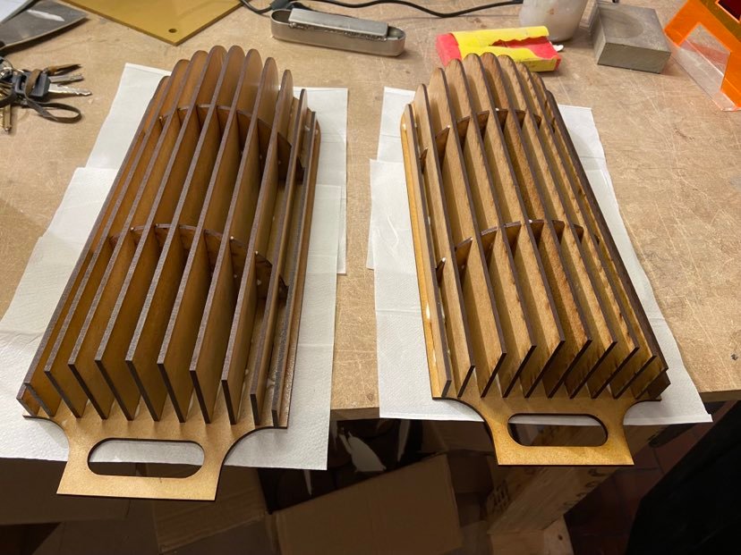 Laser-cut parts on the workshop bench